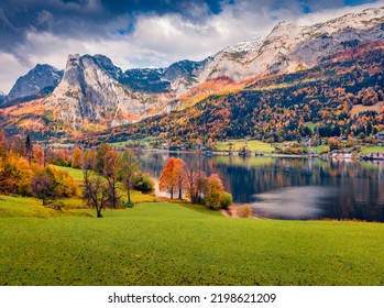 Calm autumn view of Grundlsee lake with huge mountain range on background. Colorful morning scene of Brauhof village, Styria stare of Austria, Europe. Traveling concept background. - Shutterstock ID 2198621209