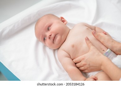 Calm Baby Undergoing A Medical Exam In Hospital