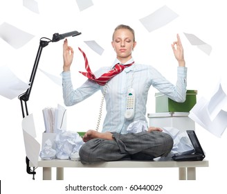 Calm business woman despite huge disorder on table and flying papers - Powered by Shutterstock