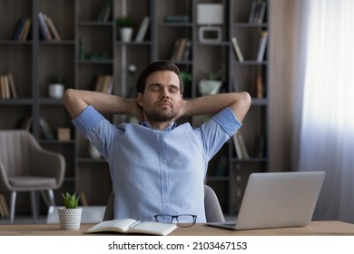 Calm businessman with closed eyes leaning back resting in office chair during break, satisfied man freelancer or student relaxing at workplace after finish work, sitting at desk, no stress concept - Shutterstock ID 2103467153
