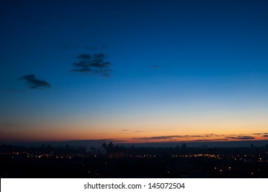 Calm Evening Cloudscape In City With Almost Clear Sky