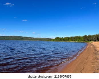 Calm Lake View In The Forest, Blue Sky