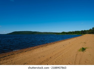 Calm Lake View In The Forest, Blue Sky