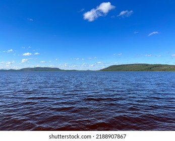 Calm Lake View In The Forest, Blue Sky