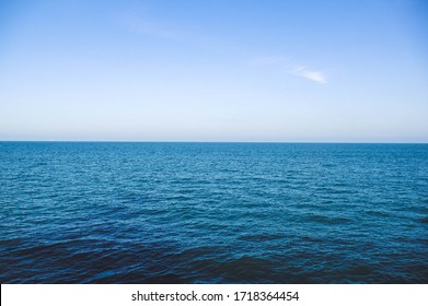 Calm mediterranean sea Ocean And Blue Sky Background waves soft surface, abstract background pattern