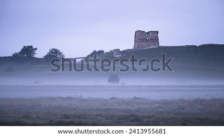 A calm morning with a view to a castle