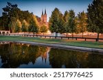 Calm morning view of two spire of Cathedral Basilica of the Assumption of the Blessed Virgin Mary, Podlaskie Voivodeship. Stunning dawn cityscape of Bialystok - largest city in northeastern Poland.