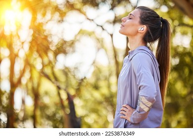 Calm, music and fitness person in nature for mental health, wellness and breathing, forest trees and fresh air. Mockup, sports and athlete woman thinking or listening to audio for running inspiration - Shutterstock ID 2253876349