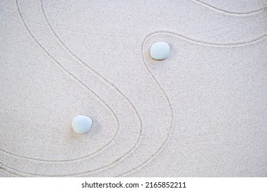 Calm Nature  Japan Concept,Zen Garden Japanese Pattern On Beach Background,Design Buddhism Texture Wave On Desert ,Top View Line Abstract On Sand With Stone,Purity Meditation Balance Or Aroma Spa.