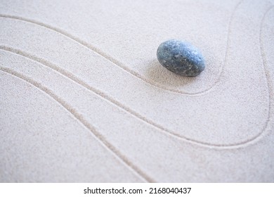 Calm Nature  Japan Concept,Zen Garden Japanese Pattern On Beach Background,Design Buddhism Texture Wave On Desert ,Top View Line Abstract On Sand With Stone,Purity Meditation Balance Or Aroma Spa.