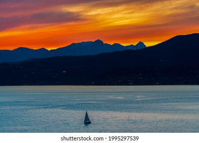 calm ocean and mountain views with beautiful sunset sky backgrounds - Powered by Shutterstock