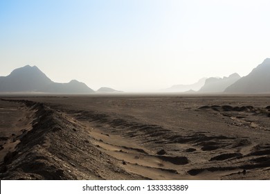 Calm outback in the salt and sand desert of Iran. Great landscapes in a very dry and hot wasteland.