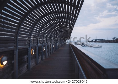 calm Pra canal - Voltri Genoa buffer zone. the marine and port environment of Genova Pra , ancient site of shipyards and today the port basin and harbor for boating. highway architecture. Foto stock © 