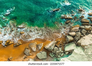 The calm sea and the rocky coast of the Oman Sea. Amazing view on the beautiful beach of Chabahar, Iran. - Powered by Shutterstock