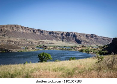 A Calm And Serene Lake In Eastern Washington Taken From The Lenore Lake Caves Hiking Trail. 