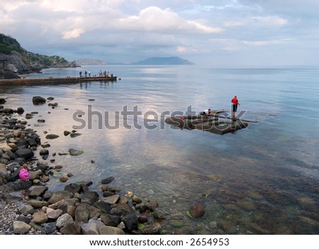 Similar – Foto Bild Felsstrand wie aus Jade