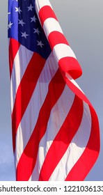 Calm, Unfurled U.S. American Red White And Blue Flag On A Sunny Day. 