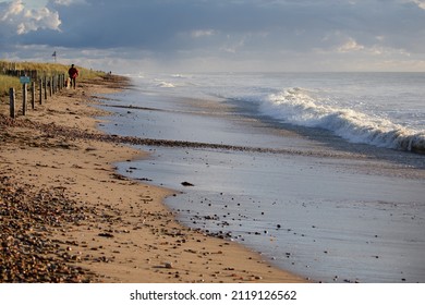 Calm Walk Along The Shore Next To A Slightly Rough Sea