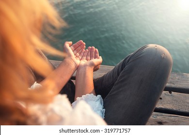 Calm Woman Meditating Reciving Light Energy With Hands