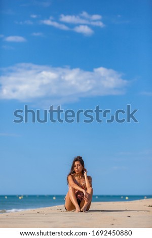 Similar – Image, Stock Photo Tattooed woman in front of a painted wall