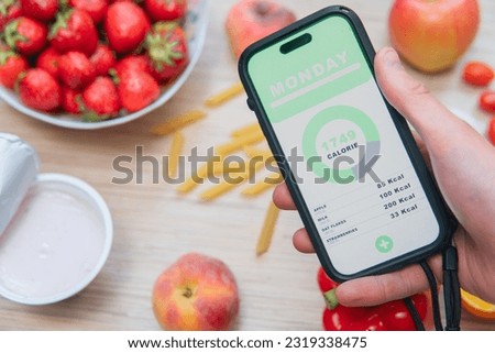calorie counting app on smartphone screen. Counting calories on a diet. Weight loss