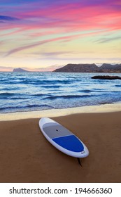 Calpe Alicante sunset at beach Cantal Roig in Mediterranean Spain with paddle sufboard