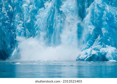 Calving ice at Dawes Glacier in Alaska, USA - Powered by Shutterstock