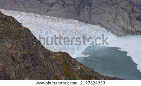 Calving iceberg from a mountain near Narsarsuaq