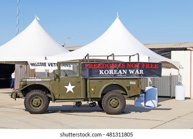 CAMARILLO/CALIFORNIA - AUG. 20, 2016: Open Bed Military Truck Parked Outside The Hanger Flies The Banner 