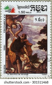 CAMBODIA - CIRCA 1985: A stamp printed in the CAMBODIA shows a painting Caliari,  "Sacrifice of Isaac", from the series "International Exhibition in Italy 85", circa 1985