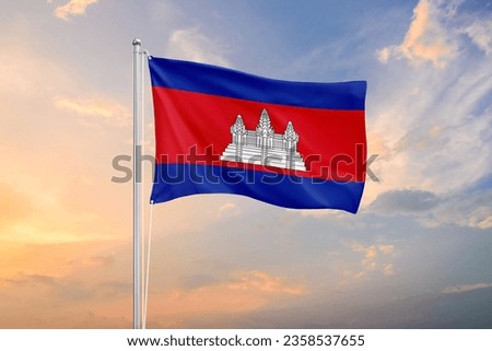 Cambodia flag waving on sundown sky