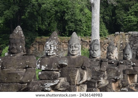 Cambodian statues at the entrance to the Angkor temples 