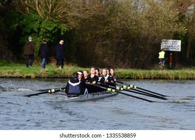 CAMBRIDGE, CAMBRIDGESHIRE, ENGLAND, UK - MARCH 09, 2019: Cambridge University College Boat Clubs Take Part In The Lent Bumps Rowing Competition On The River Cam.