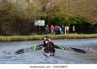 CAMBRIDGE, CAMBRIDGESHIRE, ENGLAND, UK - MARCH 09, 2019: Cambridge University College Boat Clubs Take Part In The Lent Bumps Rowing Competition On The River Cam.