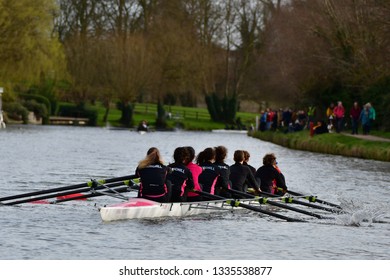 CAMBRIDGE, CAMBRIDGESHIRE, ENGLAND, UK - MARCH 09, 2019: Cambridge University College Boat Clubs Take Part In The Lent Bumps Rowing Competition On The River Cam.