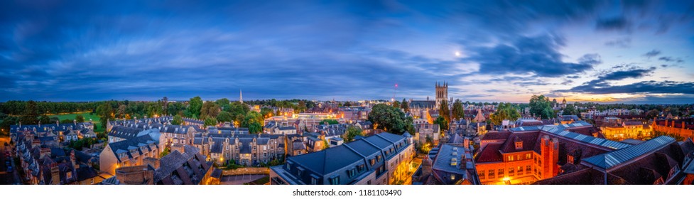 Cambridge city rooftop panorama at sunset in England