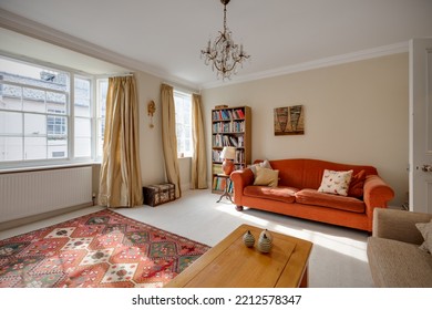 Cambridge, England - September 16 2016: Traditional Furnished Sunlit Living Room With Sofa