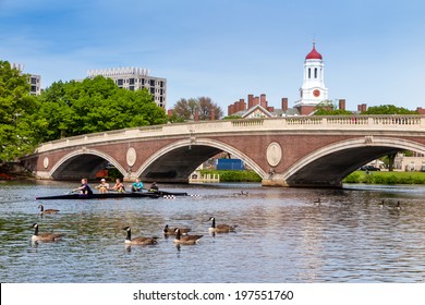 CAMBRIDGE, MA - MAY 30: A Harvard's Crimson Lightweight Crew practicing for a race in the Charles River in Massachusetts, USA on May 30, 2014