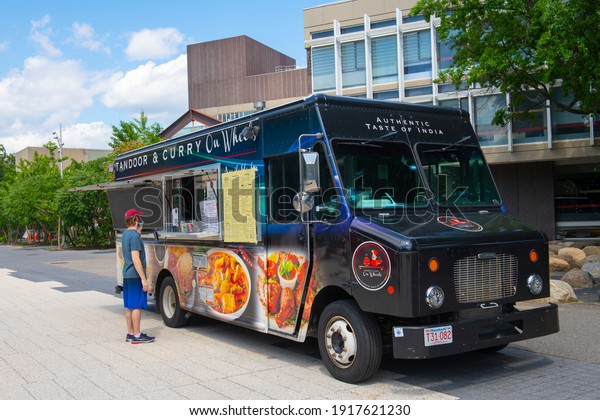 CAMBRIDGE, MA, USA - AUG. 5, 2020: Food catering truck\
near Old Harvard Yard in Harvard University, city of Cambridge,\
Massachusetts MA, USA.\
