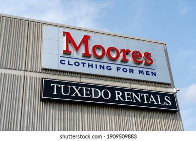 Cambridge, On, Canada- September 27, 2020: Sign Of Moores Tuxedo Distribution Centre In Cambridge, On, Canada. Moores Is A Canadian Company Specializing In Business Clothing And Formalwear For Men.