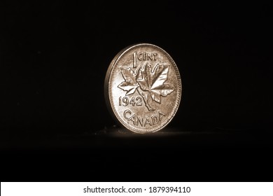 Cambridge, Ontario, Canada - December 17 2020 : A Canadian 1942 Circulated Penny  Showing The Maple Leaf Design.  