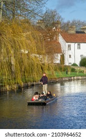 Cambridge, UK - January 7 2022: Punting on the River Cam, Cambridge, England