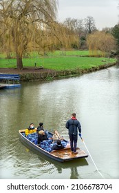 Cambridge, UK - January 7 2022: Punting trip at Mill Pond, Cambridge