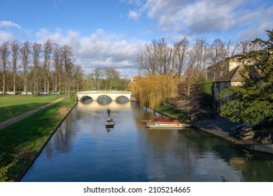 Cambridge, UK - January 7 2022:Punting on the River Cam by the Clare Bridge, Cambridge, England