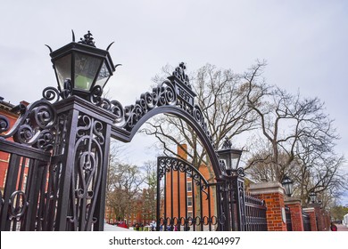 Cambridge, USA - April 29, 2015: Entrance gate and dormitory buildings in Harvard Yard of Harvard University in Cambridge, Massachusetts, MA, USA
