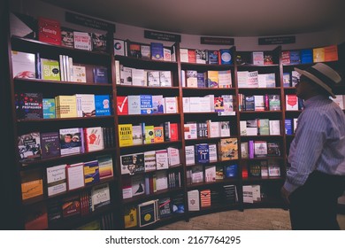 CAMBRIDGE, USA - JULY 14, 2019 : Students and customers browse for books at the Harvard Cooperative Bookstore, in Cambridge, Massachusetts