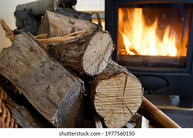 Cambridgeshire, England UK , May 3rd 2021 : Wood Burning Stove And Logs, Cosy And Warm Home But Stricter Controls Of UK Use  Of Multi Fuel Stoves               