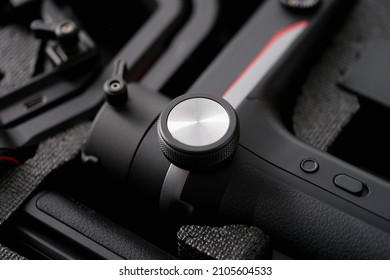 Camcorder Tripod On Black Background, Design Element