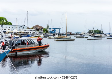 Camden, USA - June 9, 2017: Marina Harbor In Small Village In Maine During Rain With Coast Guard Boat And Officers