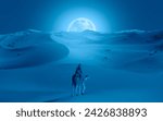 Camel caravan in the desert at night  with super full moon -  Sahara, Morrocco "Elements of this image furnished by NASA"